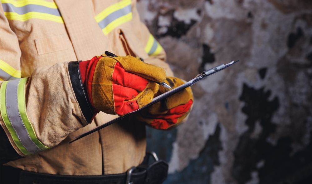 Fireman,Inspector,Conducts,Investigation,To,Determine,Circumstances,Of,Fire,In