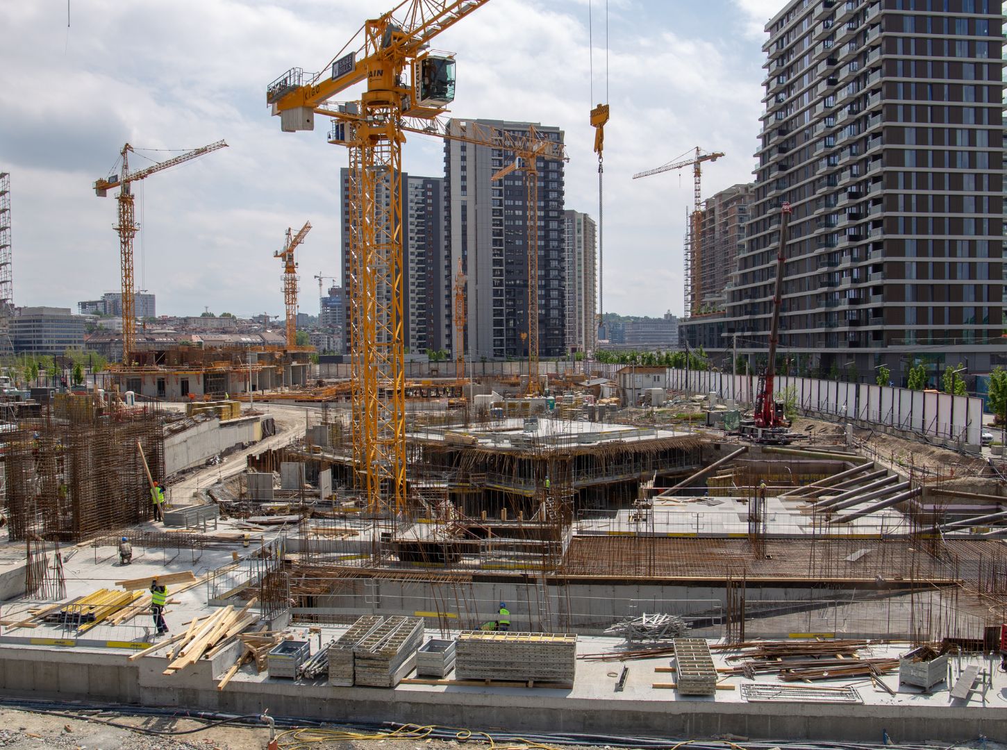 Construction industry site with high-rise building under development